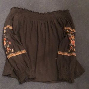 off the shoulder top with flowers on the sleeves